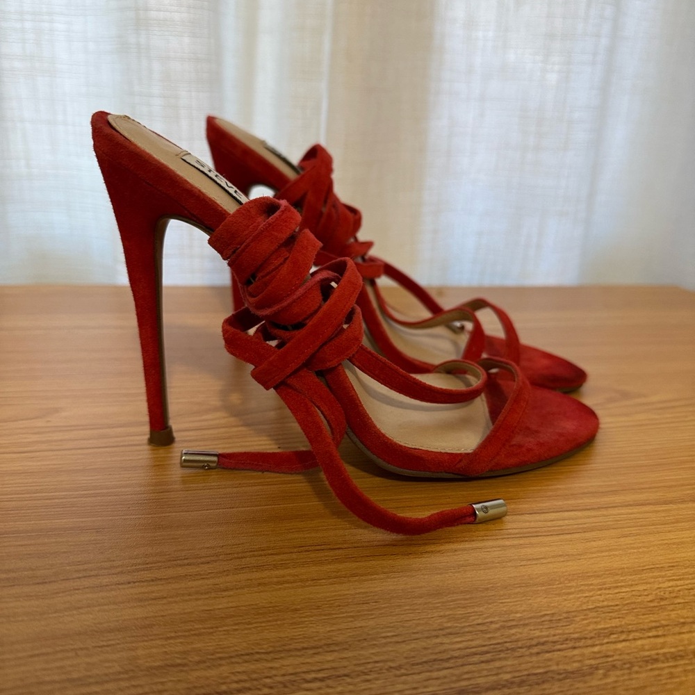 Lace up red heels
